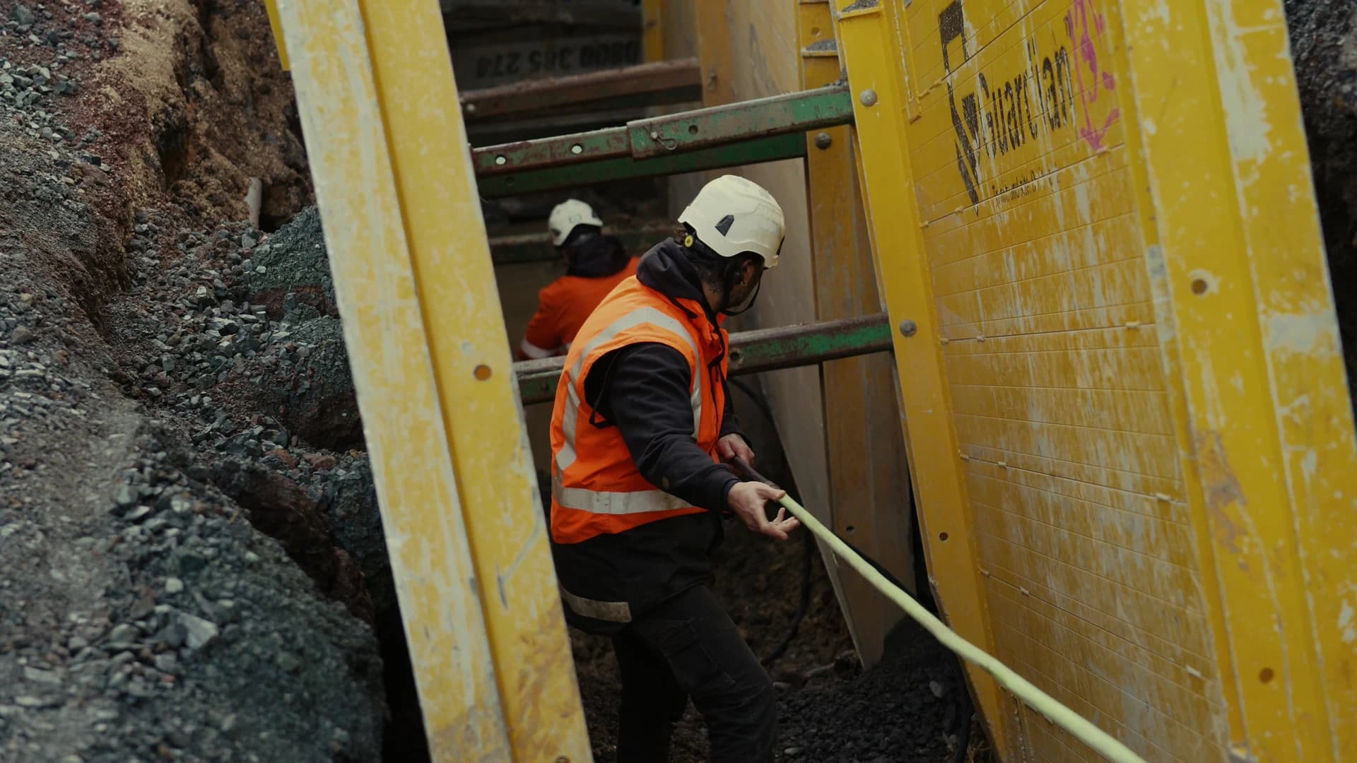 Trenching: narrow trench alongside existing services